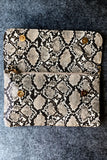 Touch Of Clutch - Beige and Black Snake Print